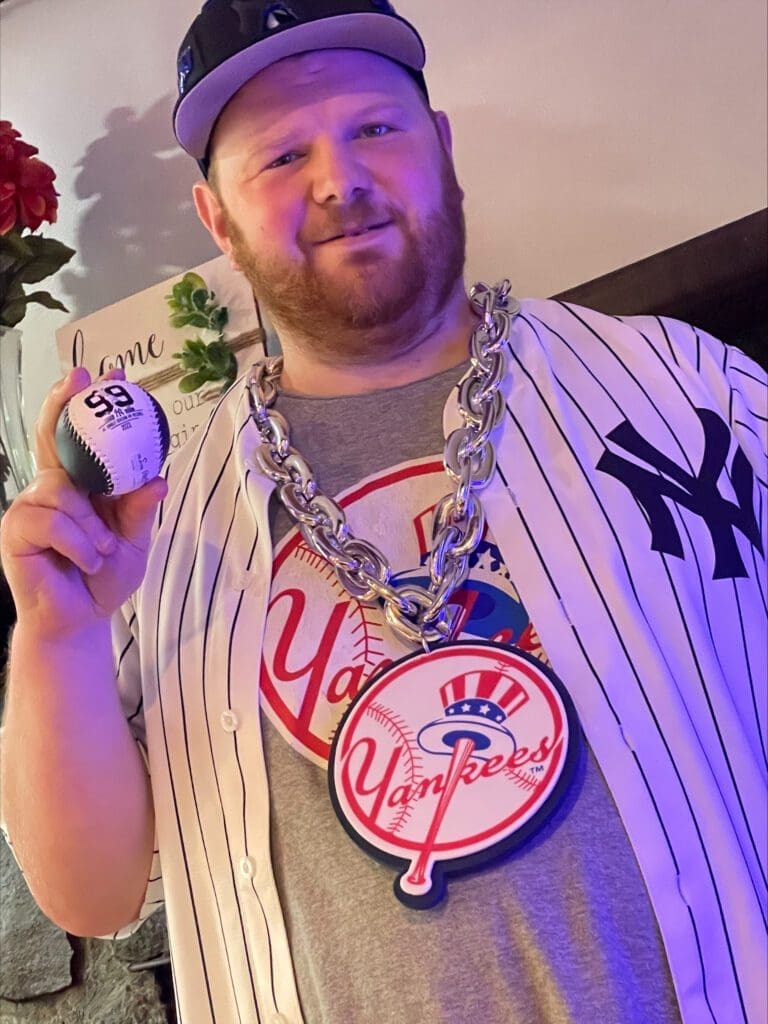 Dustin proudly wearing all of his favorite baseball teams swag getting ready to head down to the stadium.