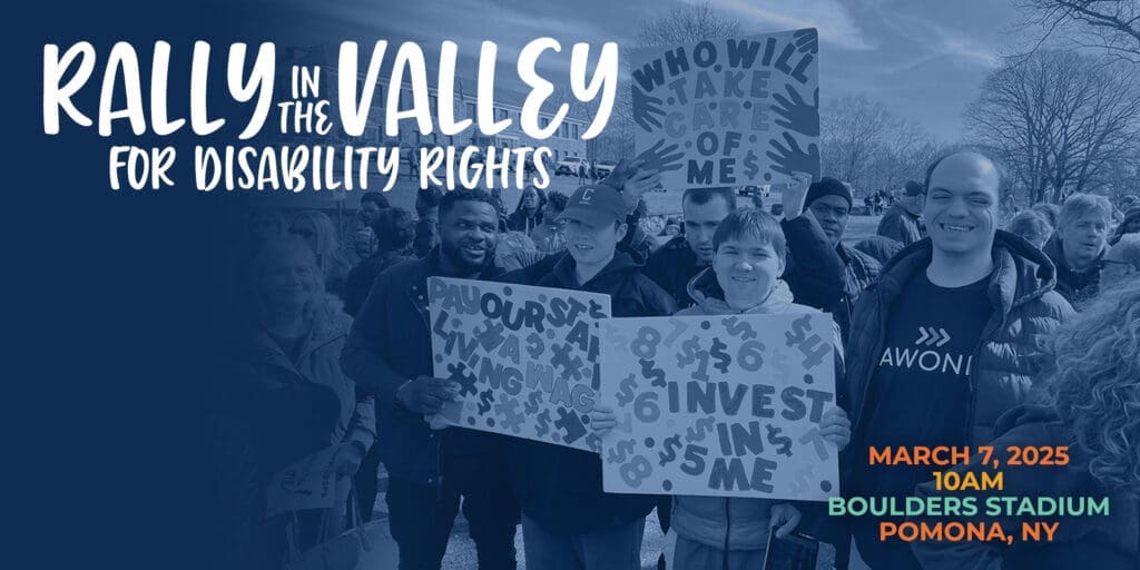 Protesters advocate disability rights with signs and unity in a valley setting.